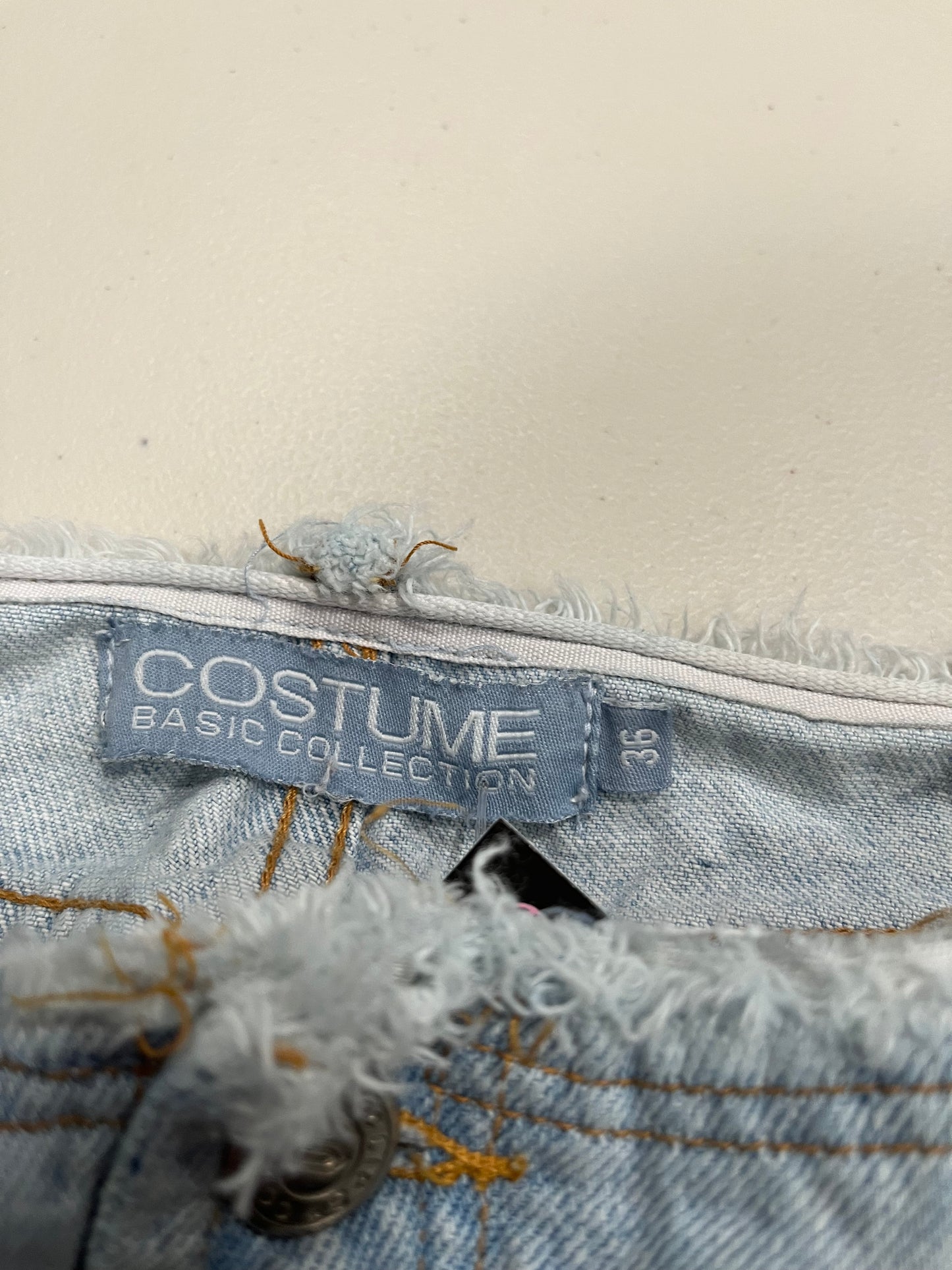 (26/27”) Vintage Flared Distressed Raw Waist Jeans