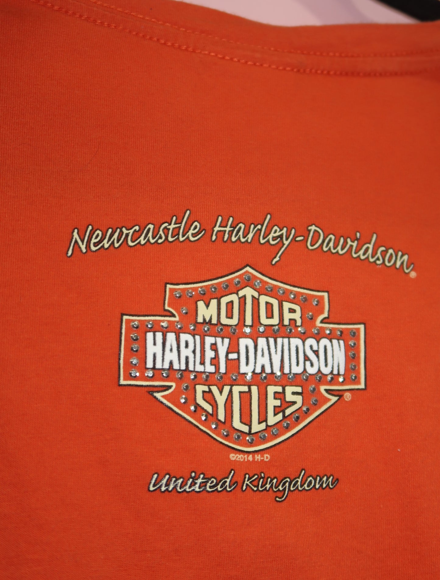 (L) Harley Davidson orange graphic top